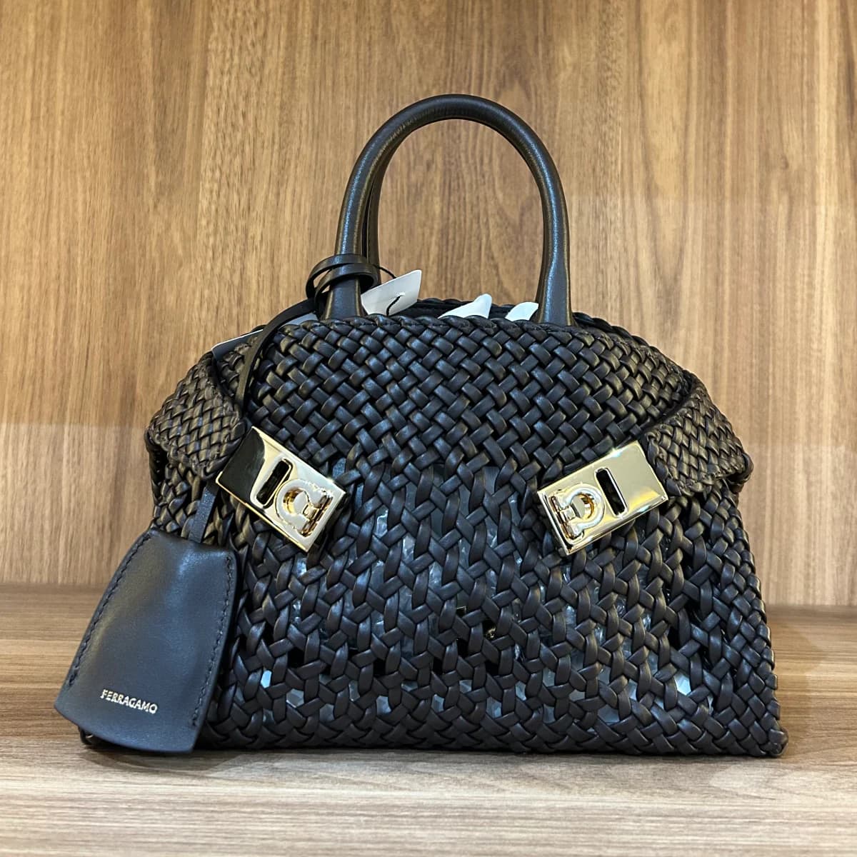 Ferragamo hug woven leather bag with gold-tone gancini hardware