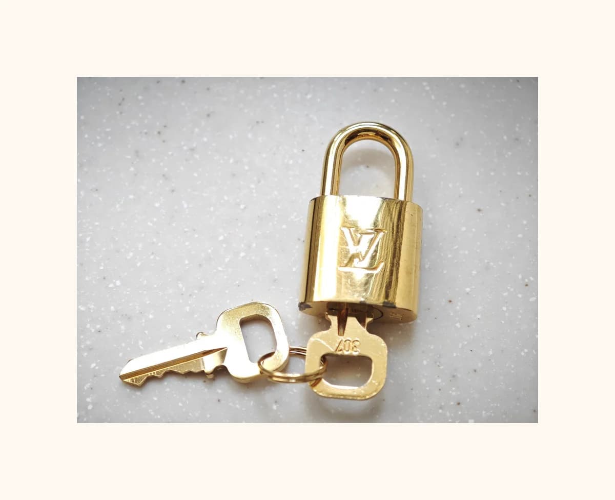 Loius Vuitton Brass Gold Padlocks and keys