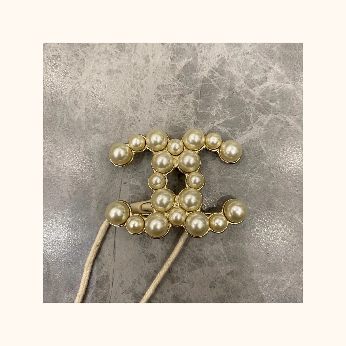 large faux pearl CC logo brooch