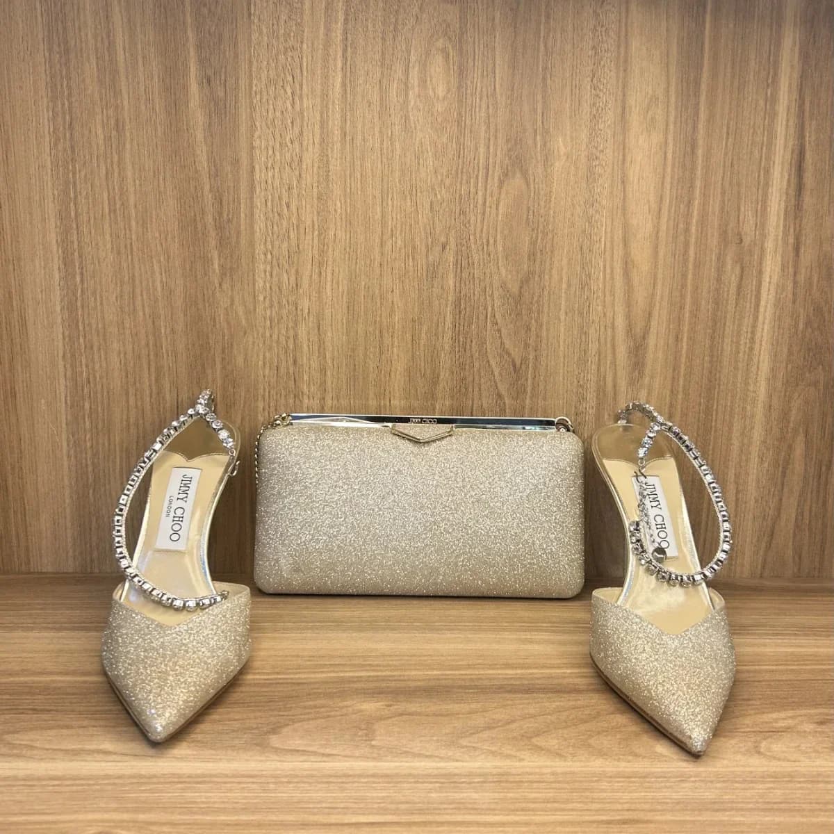 Saeda 100 pumps,crafted in platinum ice dusty -crystal embellished ankle strap with matching ellipse clutch bag