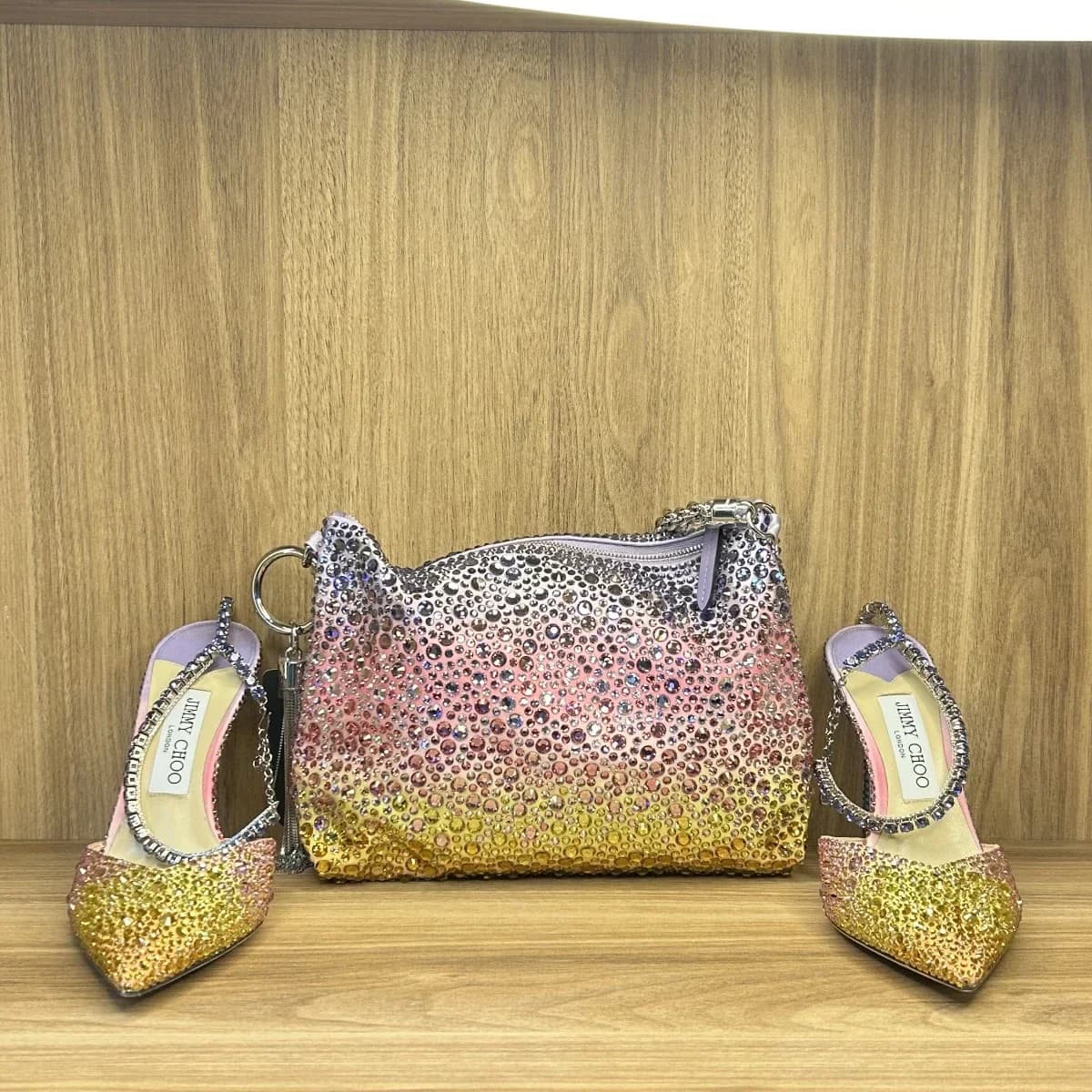 Jimmy choo callie crystal embellished clutch bag with matching Saeda 100
